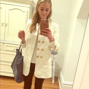 White over coat with gold flower buttons